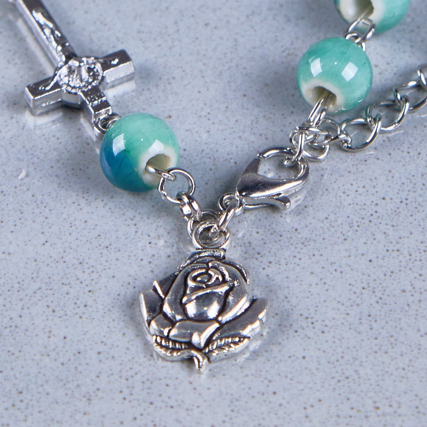 christiandiscipleshop Joyful Blossom Green Tone Ceramics Beads Rose & Crucifix Bracelet