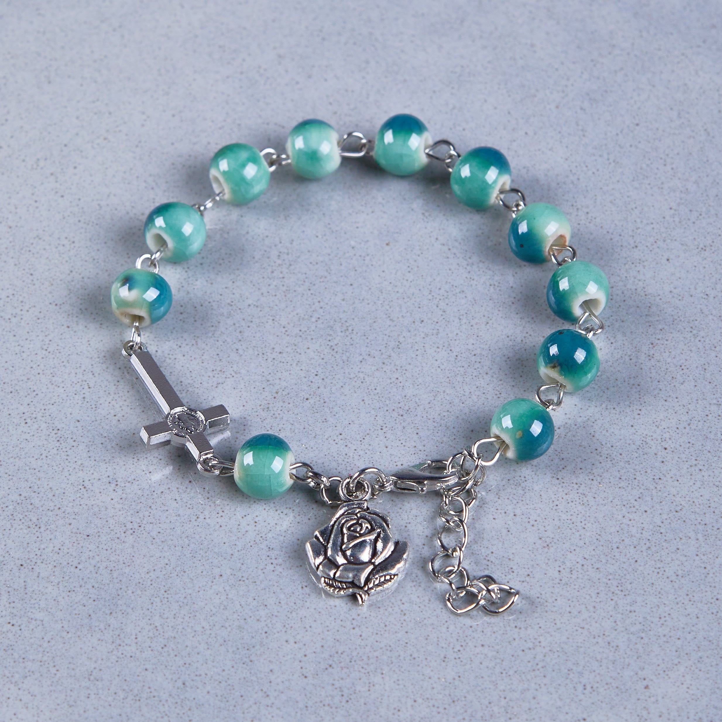 christiandiscipleshop Joyful Blossom Green Tone Ceramics Beads Rose & Crucifix Bracelet