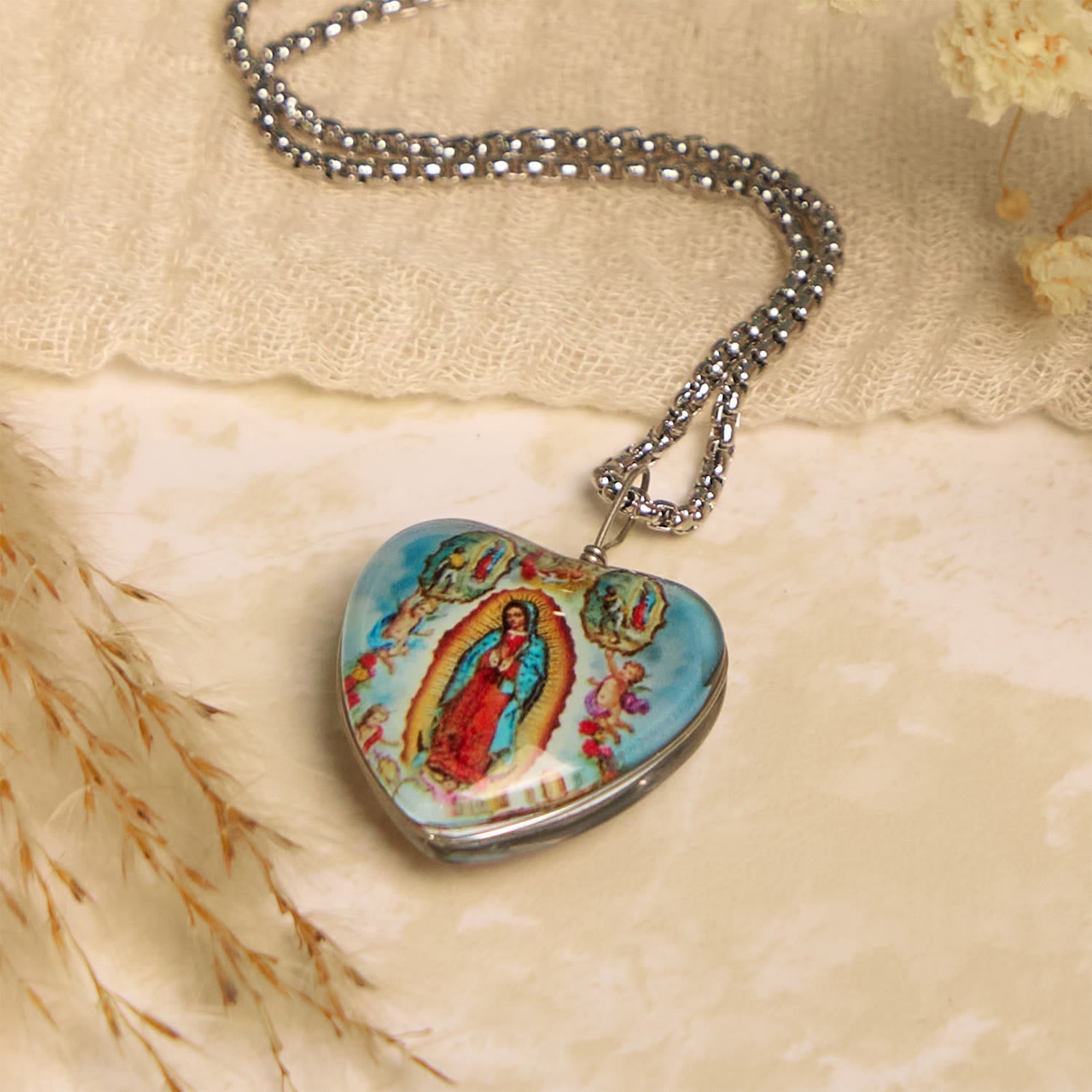 Christianartworkshop Blue Our Lady of Guadalupe Glow-in-the-Dark Heart Shaped Resin Medal Necklace
