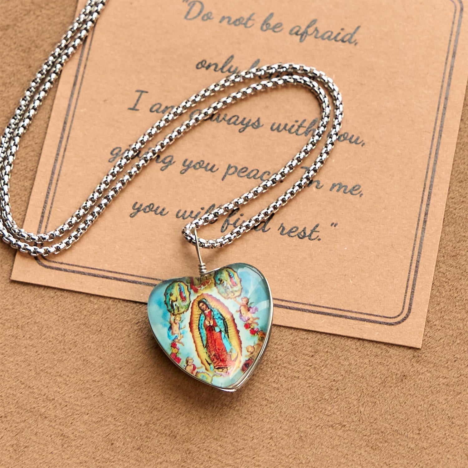 Christianartworkshop Blue Our Lady of Guadalupe Glow-in-the-Dark Heart Shaped Resin Medal Necklace